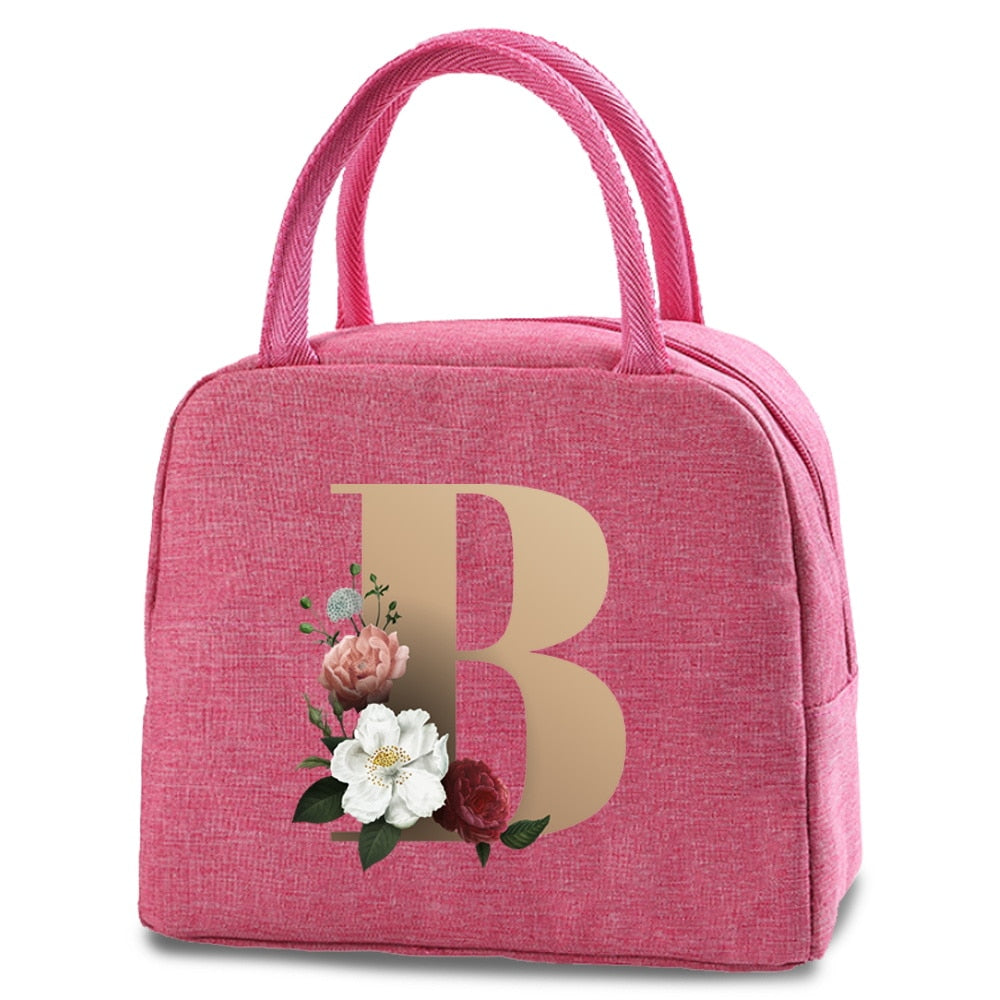 Bolso portátil con estampado de letras e iniciales doradas, ideal para guardar comida