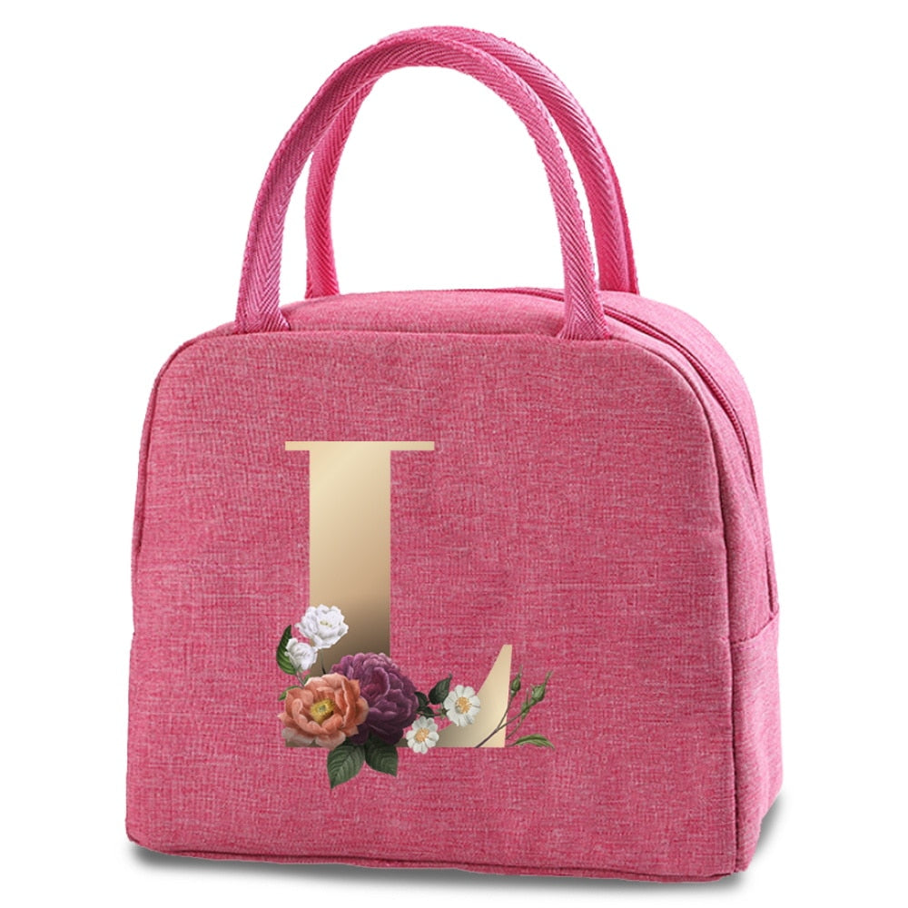 Bolso portátil con estampado de letras e iniciales doradas, ideal para guardar comida