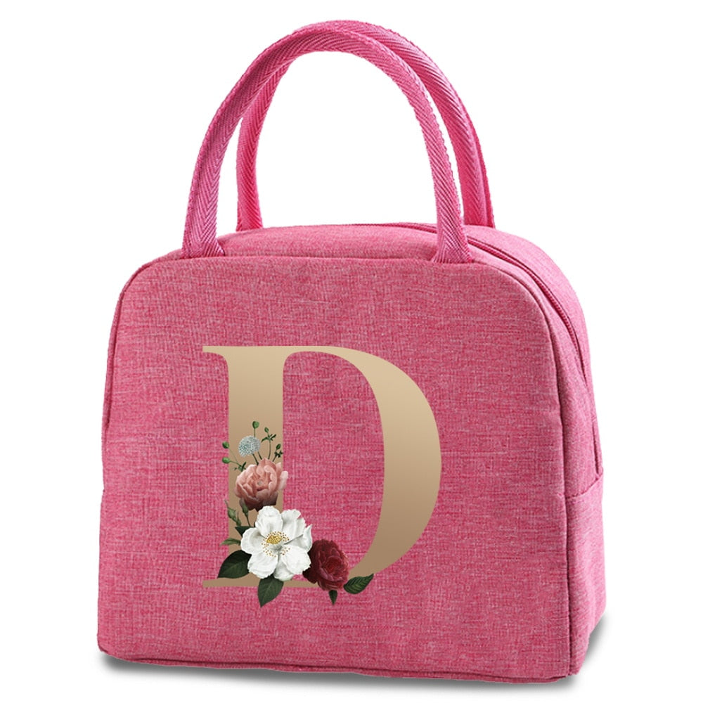 Bolso portátil con estampado de letras e iniciales doradas, ideal para guardar comida