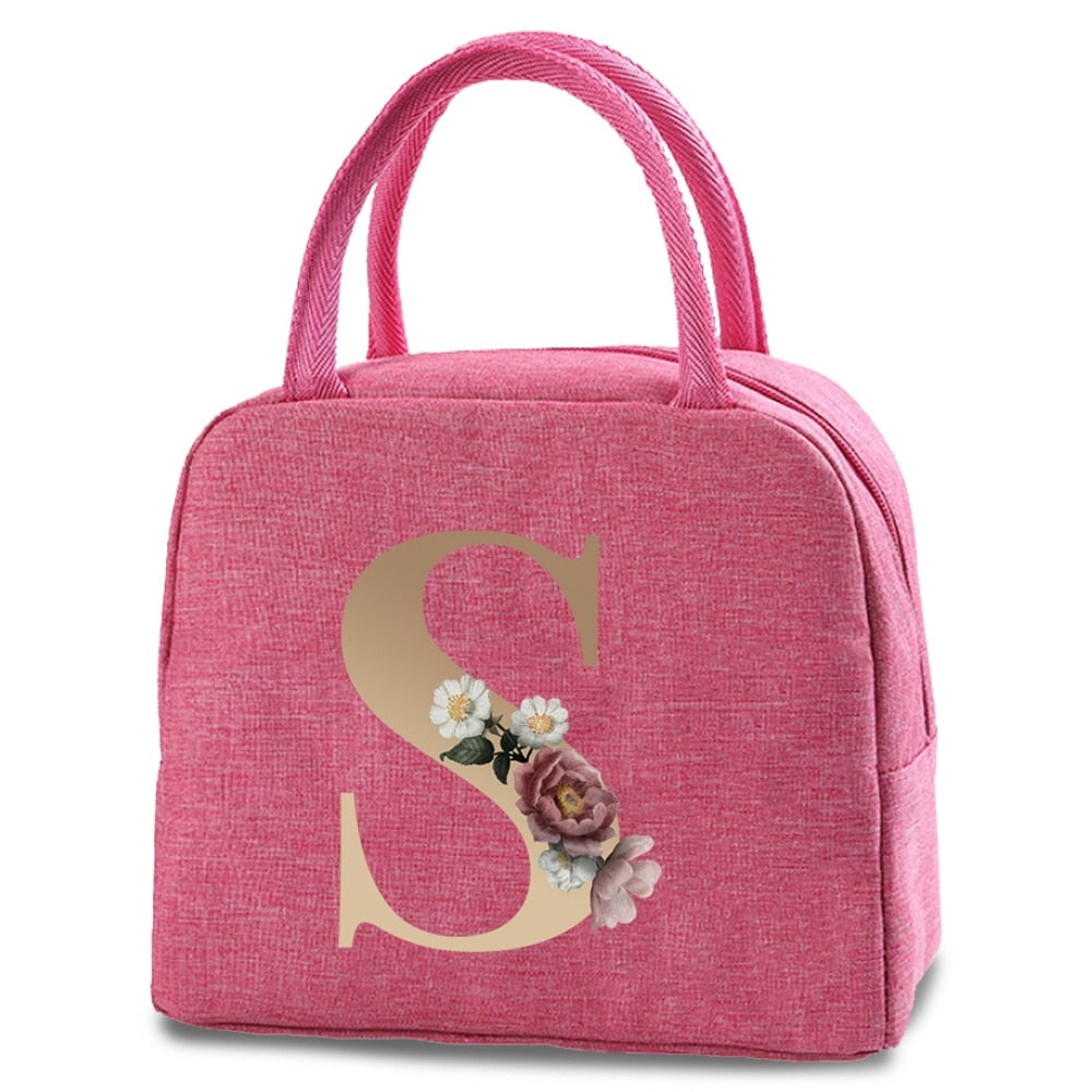 Bolso portátil con estampado de letras e iniciales doradas, ideal para guardar comida