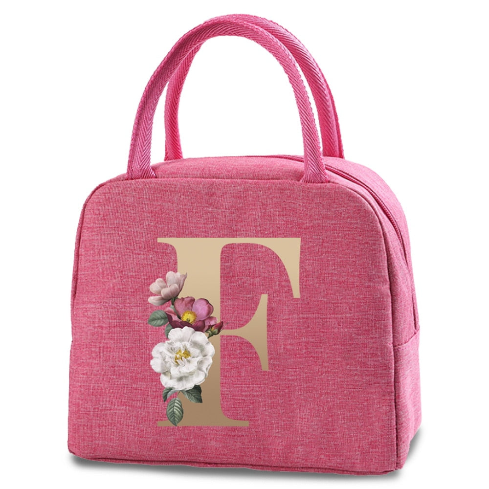 Bolso portátil con estampado de letras e iniciales doradas, ideal para guardar comida